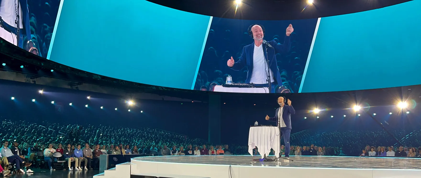 Bronkar Lee speaking to a large live audience